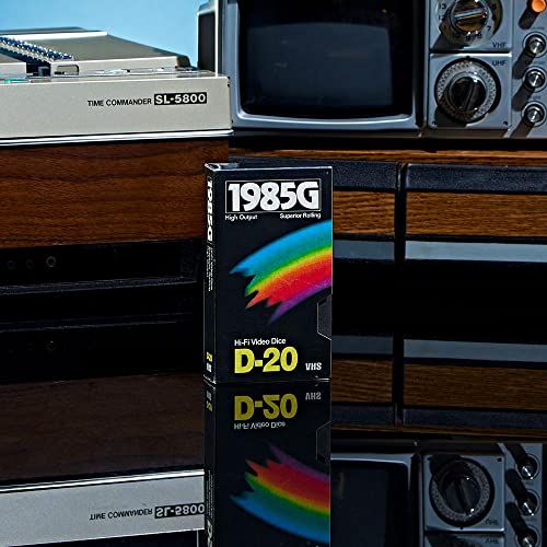 Image of 1985 Games Sharp Edge DND Dice Set - Starstorm Polyhedral Dice in Retro VHS Box - 5E TTRPG Dice Set - Tabletop RPG Accessory (Set of 7)