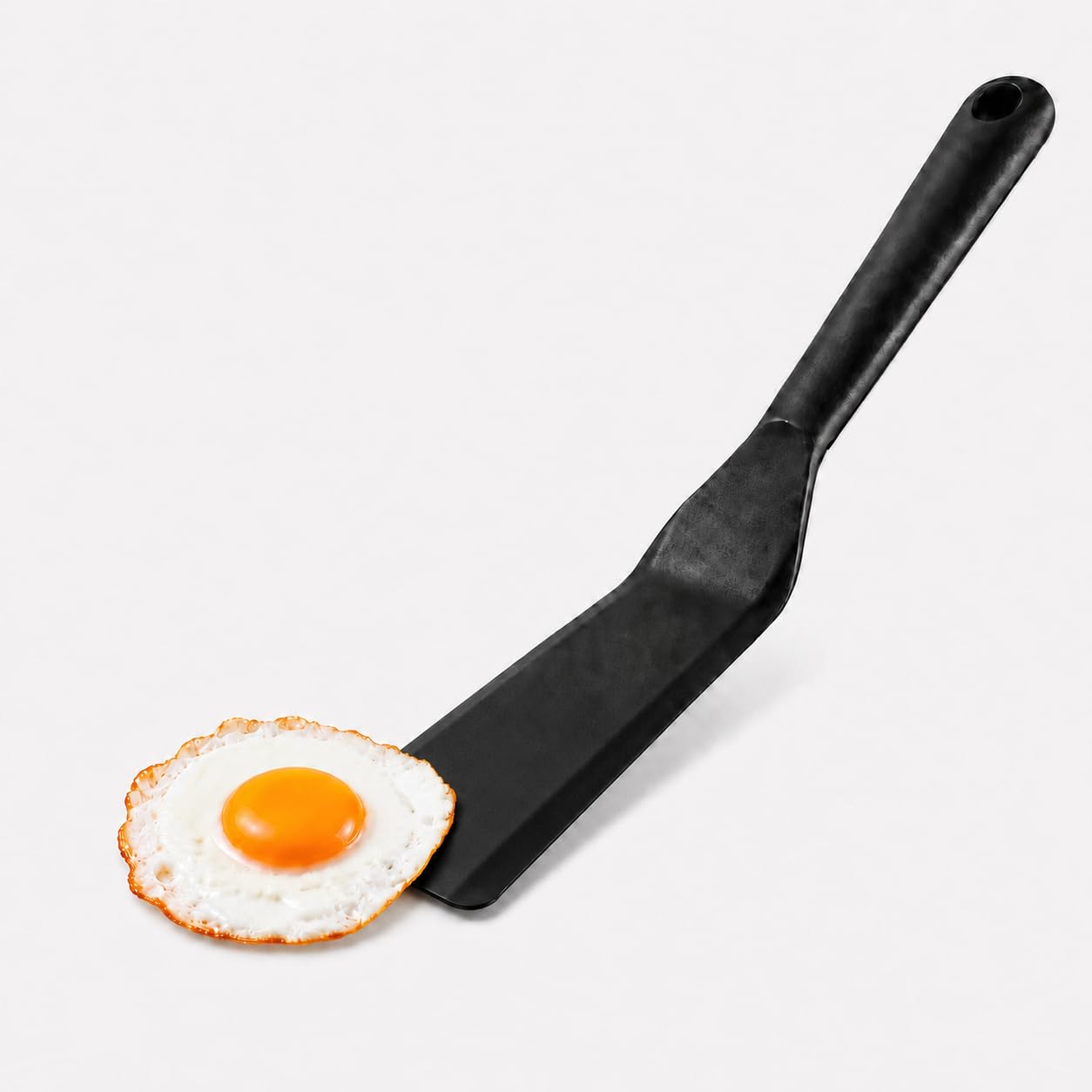 Egg Spatula is Heat Resistant Non-Stick Pancake Spatula - Silicone Spatula is used as Omlet Flipper for Cooking.