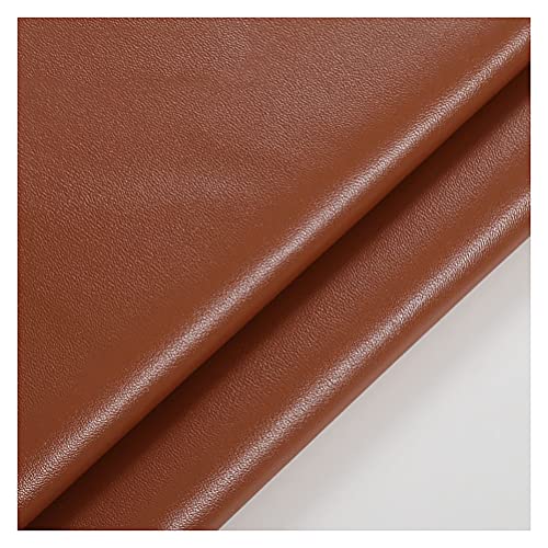 Réparation de décoration en cuir synthétique marron pour rénover un canapé usé