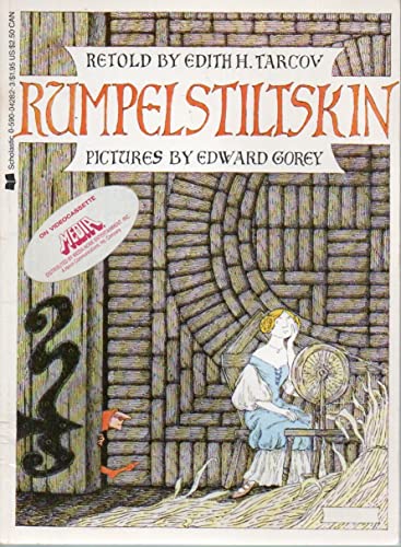 Rumpelstiltskin A Tale Told Long Ago by the Gri... 0590042823 Book Cover