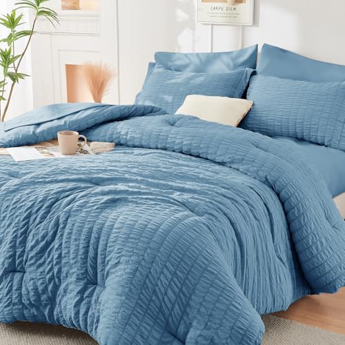 Image of HYMOKEGE Mineral Blue Oversized King Comforter Set Seersucker 7 Pieces, All Season Luxury Bed in a Bag for Bedroom, Bedding Set with Comforter, Sheets, Pillowcases & Shams