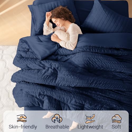 Image of MUXHOMO 7 Pieces Oversized Queen Comforter Set, Seersucker Bed in a Bag Oversized Queen Size, All Season Luxury Bedding Set with Comforter, Flat Sheet, Fitted Sheet, Pillowcases & Shams, Navy Blue