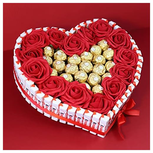 Onza. Cesta regalo de Bombones Ferrero Rocher y Rosas decorativas. Tarta de bombones y chocolates originales para regalar por Navidad, a tu pareja con forma de corazón. Chocolatinas Kinder Bueno.