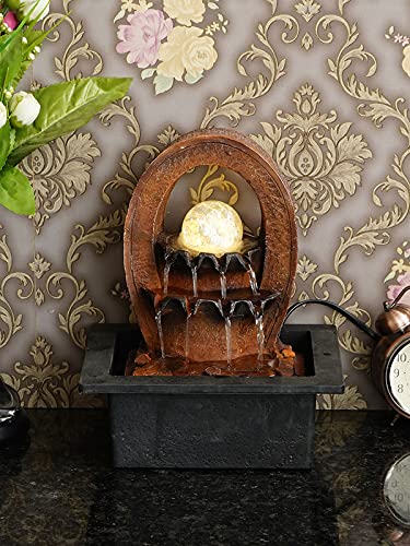 Image of INDIANA CRAFT Polyresin Brown Designer Oval Table Top Indoor 2 Steps Waterfall Fountain with Yellow LED Lights, Water Flow Controller Pump and Crystal Ball (Size: 25 x 21 x 18.5CM | Weight: 1180grm)