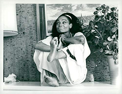 Vintage photo of Eartha Kitt jokes in meditation bag