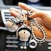 TYUXINSD Magnifique Keychain Doraemon Keychain Figure Pied à la Main Movable Casque coloré Bell Jouets pour Enfants Pendentif Dessin animé (Couleur: Noir) (Color : Green)
