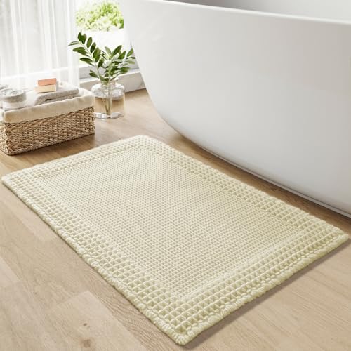 RESARE Waffle Bath Mat for Bathroom, Super Absorbent Bathroom Rugs Non Slip Machine Washable, Ultra Soft Quick Dry Boho Bath Rugs with Tassels for Floor, Upgraded Bordered Design, 17'x24' Cream