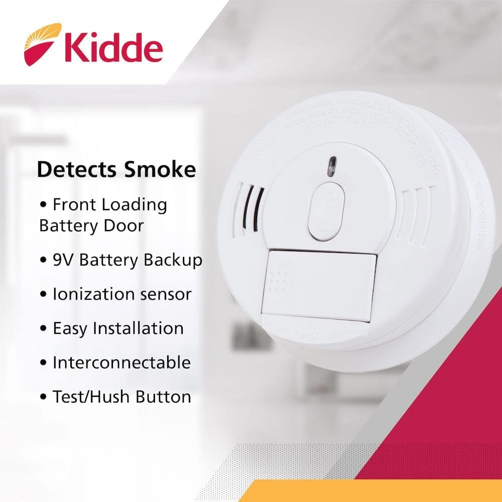 Depan view of Kidde FireX smoke detector highlighting the test/hush button and battery door.