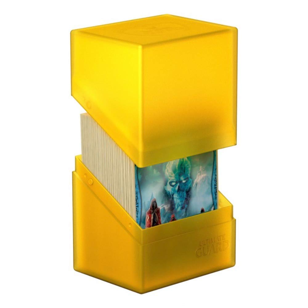 The amber Ultimate Guard Boulder 80+ Classic deck case showcasing its soft-touch finish and compact form factor.