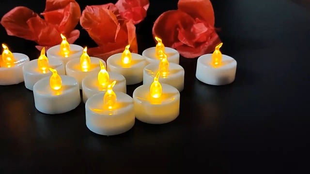 Image of 12 PCS Warm White Flickering Tea Light Candles with Timer