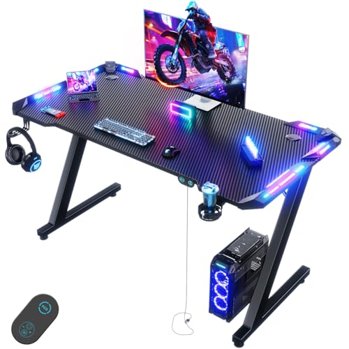 Devoko Mesa Gaming LED 120 x 60 cm, Escritorio Gaming de Fibra de Carbono, Mesa de Juego, Escritorio de Juego Ergonómico con Ganchos para Auriculares y Soporte para Vasos de Agua