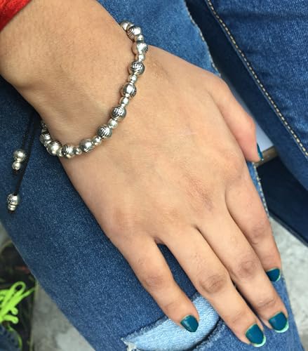 Image of Touchstone New Indian Bollywood Handcrafted Magical Look Engraved Metallic Beads Elegant and Attractive Designer Jewelry Openable Thread Bracelet in Oxidized Silver Tone for Women.