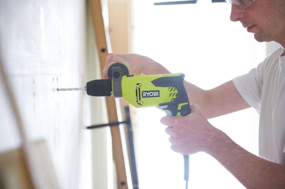 Ryobi RPD500-GC, Trapano a Percussione 500W, Mandrino Autoserrante, Variatore Elettronico di Velocità, 3000 giri/min, Impugnatura GripZone, Compatto e Leggero