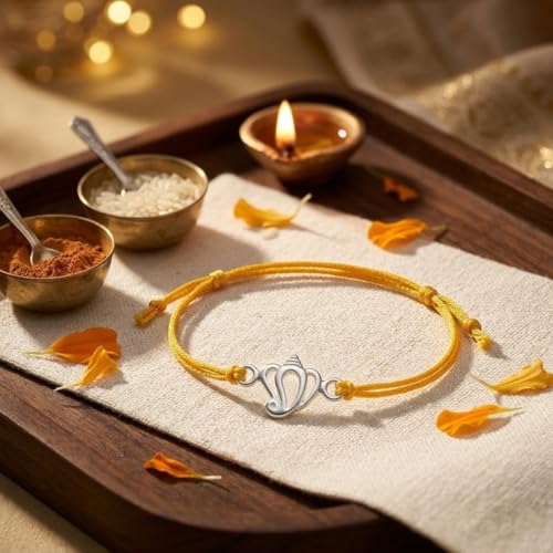 Image of Parnika 925 Pure 92.5 Sterling Silver Ganesha Rakhi Bracelet for Brother | Hallmarked Silver Rakhi for Bhai & Bhaiya | Raksha Bandhan Gift with Roli Chawal | Premium Thread Rakhi