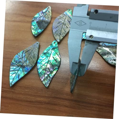 Collier coquillage dormeau feuille pour sublimer un décolleté terne
