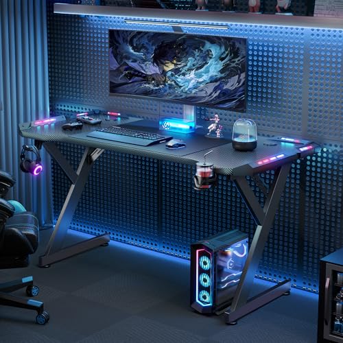 Image of HLDIRECT 63 INCH Gaming Desk with LED Lights, Home Office Gamer Desk, Ergonomic Computer Table with Large Carbon Fiber Desktop, Office Workstation with Mouse Pad, Cup Holder & Headphone Hook, Black