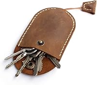 Vista 1 de Funda de cuero hecha a mano con cordón para llaves ovalada con cierre de botón a presión seguro para llaves de coche, llaves de casa Marrón