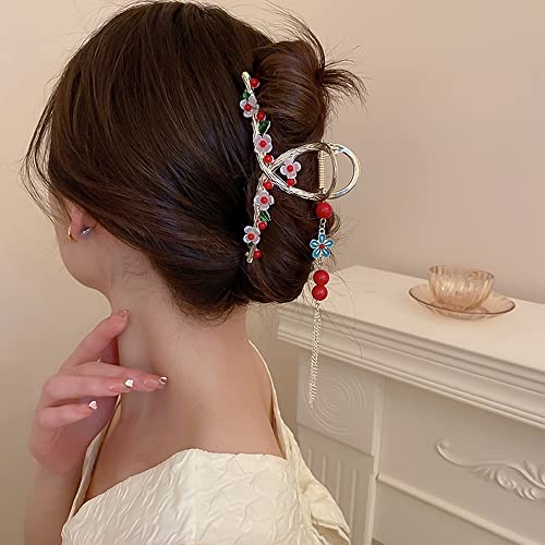 Pince à cheveux en métal doré pour mariages et soirées élégantes avec détails de perles.