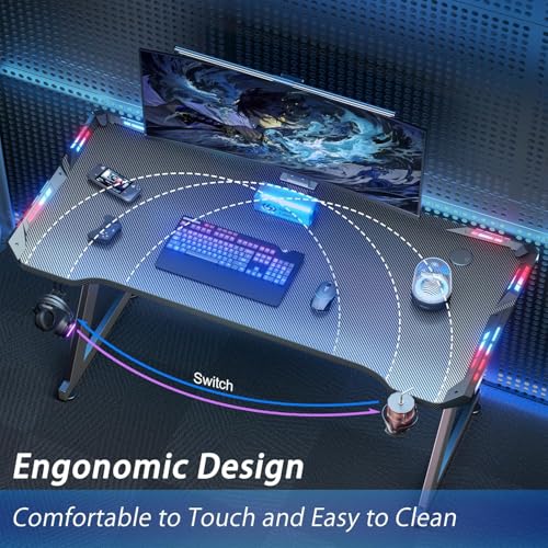 Image of HLDIRECT 47 Inch Gaming Desk with LED Lights, Ergonomic Computer Gaming Table with Carbon Fibre Surface, Sturdy PC Workstation Desk for Home Office with Headphone Hook, Cup Holder, Black