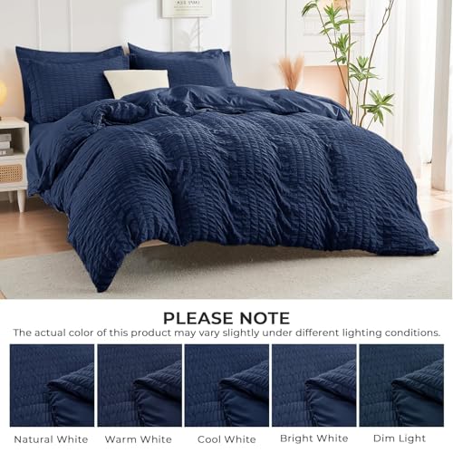 Image of HYMOKEGE Navy Blue California King Comforter Set Seersucker 7 Pieces, All Season Luxury Bed in a Bag for Bedroom, Bedding Set with Comforters, Sheets, Pillowcases & Shams