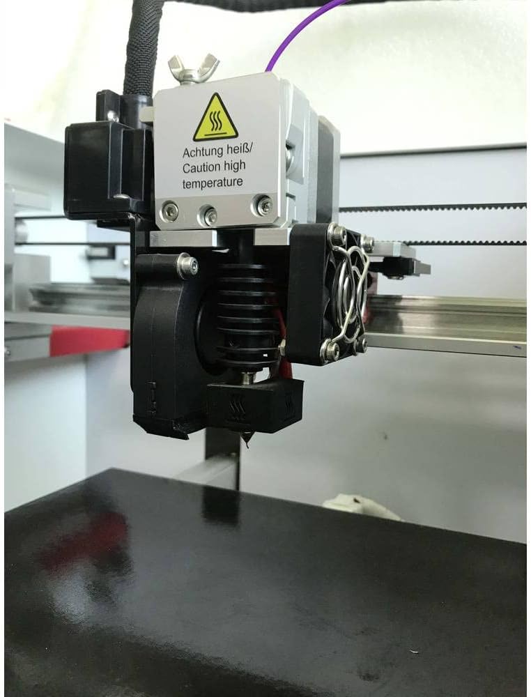 Detailed close-up of the Renkforce PRO3 3D Printer's extruder and hotend assembly, showing cooling fans and wiring.