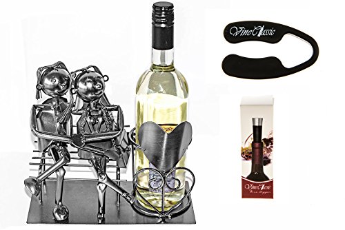 Fabulous Couple Siting 0n a Bench Next to a Wine Bottle Stand That Has a Heart on It Wine Bottle Holder Plus a Wine Foil Cutter and a Wine Bottle Vacuum Stopper