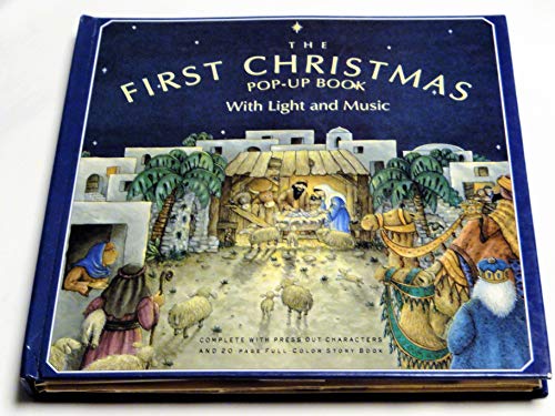 The First Christmas Pop-Up Book with Light & Music 0840749074 Book Cover