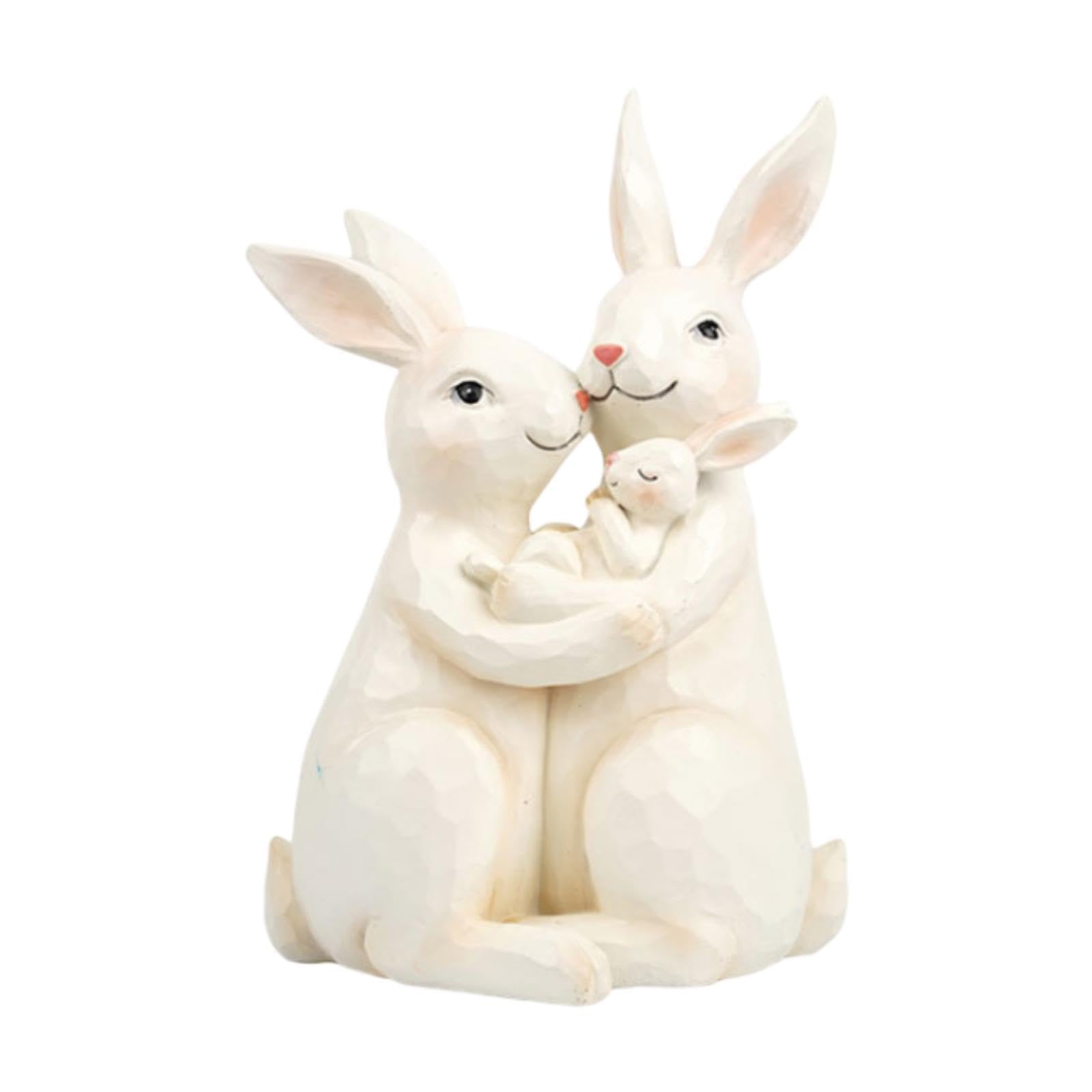 Arte artesanal en resina: Escultura de conejo familiar para decoración exclusiva