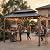 Sunjoy Wooden Grill Gazebo, 8 x 12 ft. Steel Hardtop Outdoor Gazebo for Year-Round Grilling, 2 Full Size Grills, Griddles or Smokers - Cook Station, Barbeque, Built-in Electrical Outlets, Brown