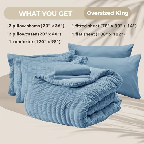 Image of HYMOKEGE Mineral Blue Oversized King Comforter Set Seersucker 7 Pieces, All Season Luxury Bed in a Bag for Bedroom, Bedding Set with Comforter, Sheets, Pillowcases & Shams