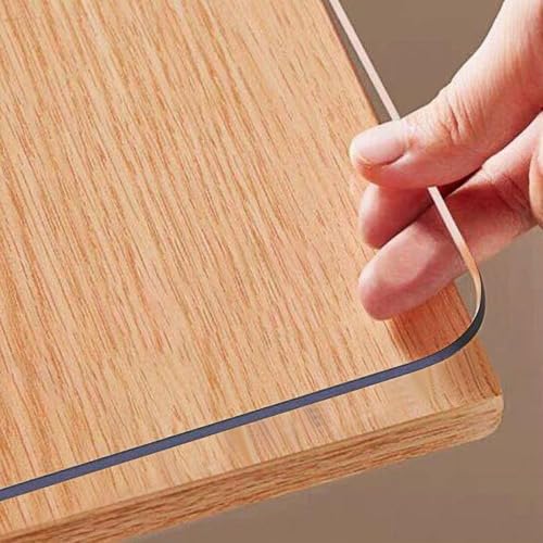 Image of Sleep Nature's Transparent PVC Table Cover - Clear Waterproof Table Protector for 4 & 6 Seater Dining Table, Office Desk, Thick Heavy Duty Tablecloth, Spill-Proof, Easy to Clean 2 MM 30x54 inch