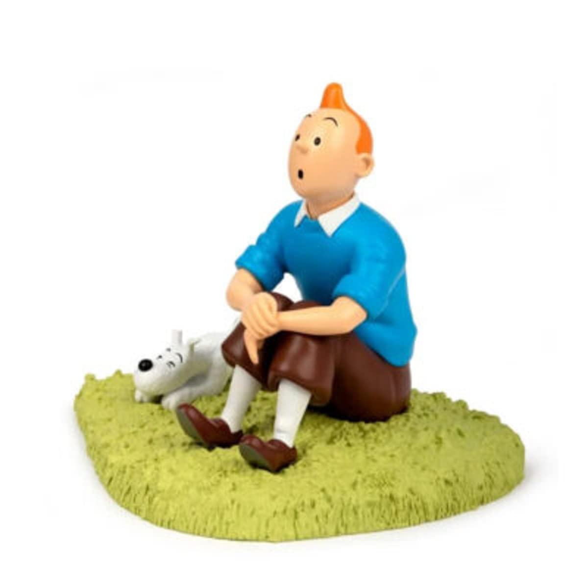 Tintin assis sur l'herbe décor enneigé pour salon et bibliothèque