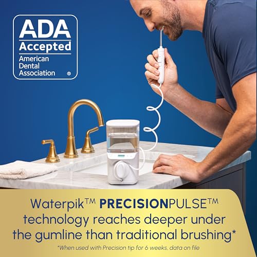 Waterpik Promax Water Flosser with SmartAdvance Mode for Daily Gum Health and Cleaning Teeth, Braces, Implants, ADA Accepted, Small Quiet Design, Electric Flosser with 10 Settings, 5 Tips, WF-23