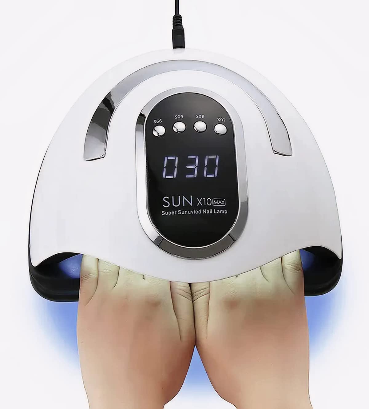 Hands inside SUN X10 MAX nail lamp