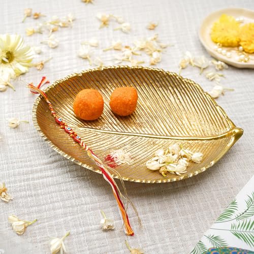 Image of BEHOMA Metal Leaf Shape Tray, 11 & 8 inch, Set of 2 | Set of 2 golden leaf-shape metal trays, 11 inch & 8 inch; perfect for haldi, mehendi & Navratri decor.
