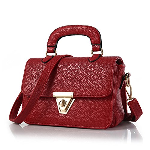 Sac de mode fleur et ordinateur portable du bureau au café