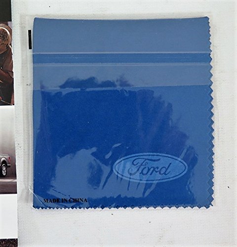 Blue cloth owner's manual pouch with Ford logo.
