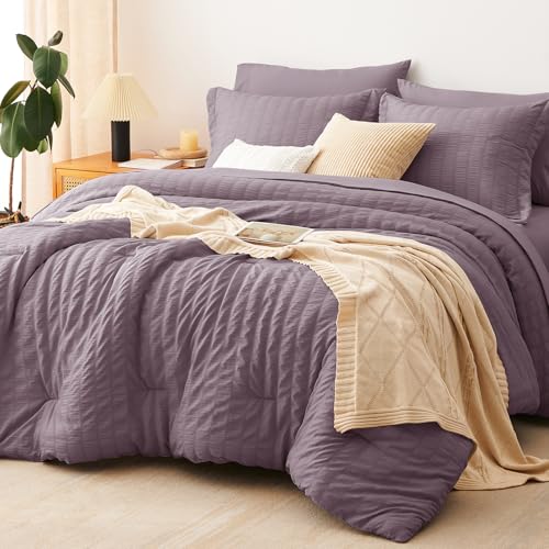 Image of CozyLux Oversized Queen Comforter Set with Sheets, 7 Pieces 98 inchx98 inch Dusty Purple Seersucker Bed in a Bag, Soft Grayish Purple Bedding Sets with Down Alternative Comforter, Sheets, Pillowcases & Shams