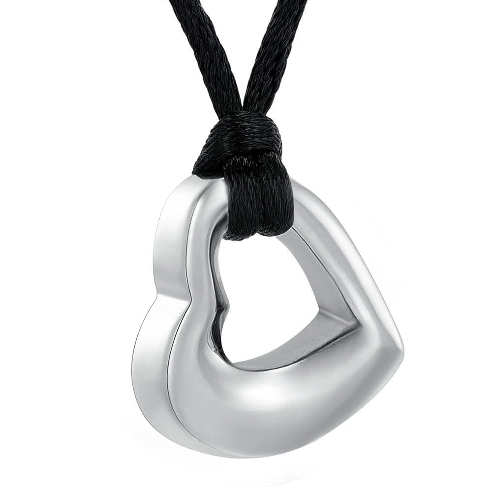 Pendentif urne funéraire cœur en acier pour surmonter le deuil et l'absence