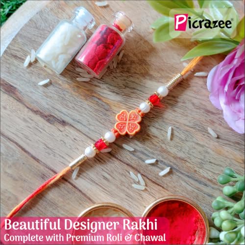 Image of PICRAZEE Rakhi Gift Combo for Brother with Mug, Rakhi, Card, Tika, Fridge Magnet & Keyring (The Best Brother)