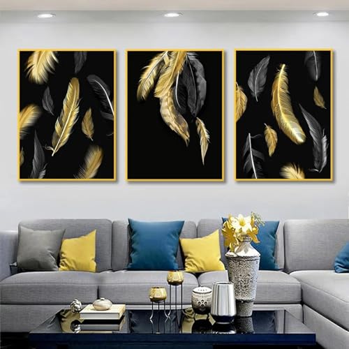 Tableaux muraux salon pour habiller un mur vide avec triptyque plumes dorées