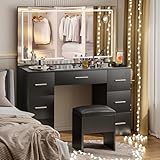 VALONDINO Makeup Vanity Desk with Lights, 46'' Glass Top Vanity Set with Charging Station, 7 Drawers Vanity Table with Cushioned Stool, 3 Lighting Modes Brightness Adjustable,Black