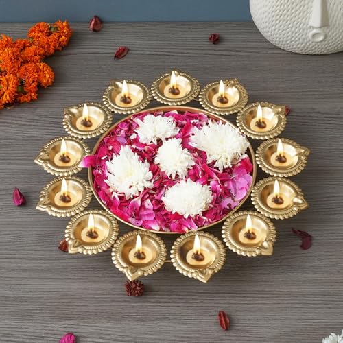 ECraftIndia Golden Metal Handcrafted Designer Urli With 13 Diyas – Elegant Home Decor Centerpiece, For Rs. 349 @ 65 %
