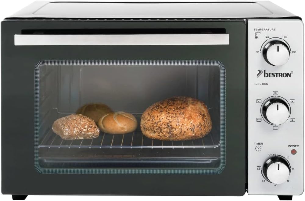 Bestron AOV31 Mini Oven with a pizza baking inside