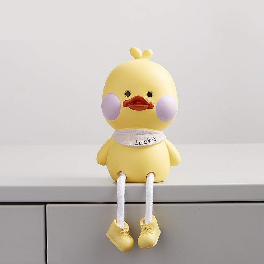 Petit canard jaune statue compacte et stable pour tableau de bord voiture