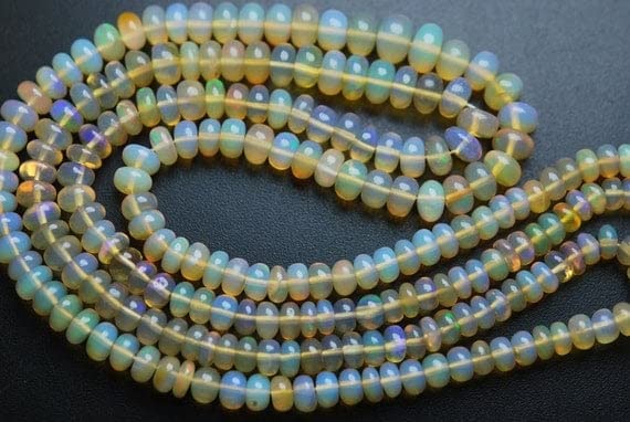 Opale naturelle jaune d'Éthiopie en grands rangs de perles pour offrir un bijou fait main unique