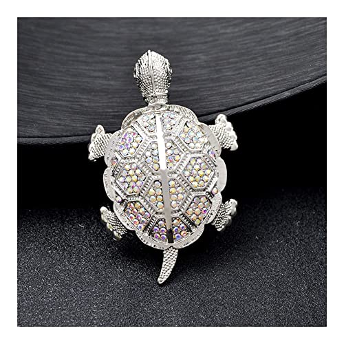Broche tortue strass vert : l'accessoire rétro idéal pour vos soirées