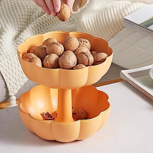 Boîte à bonbons citrouille contre le désordre de la table basse de salon