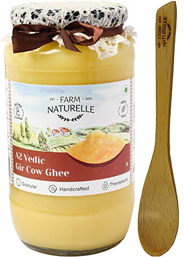 Image of Farm Naturelle-A2 Desi Cow Ghee from Grass Fed Gir Cows | Vedic Bilona Method-Curd Churned-Golden Ghee |Grainy & Aromatic, Keto Friendly, Lab Tested, Non-GMO Glass Jar-1000ml and a Wooden Spoon.