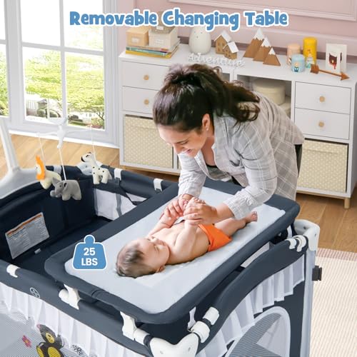 Image of BABY JOY 4 in 1 Pack and Play with Canopy, Portable Baby Playard with Bassinet, Double-Layer Baby Crib, Wheels & Brake, Foldable Baby Girl Pink Bassinet from Newborn to Toddler